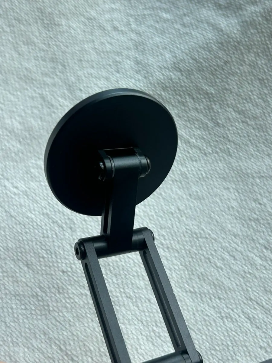 Stand with a subdued matte-black design