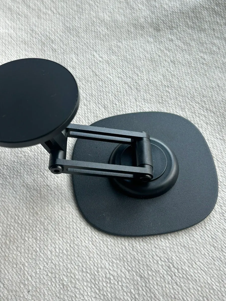 Stand with a silicone-pad base