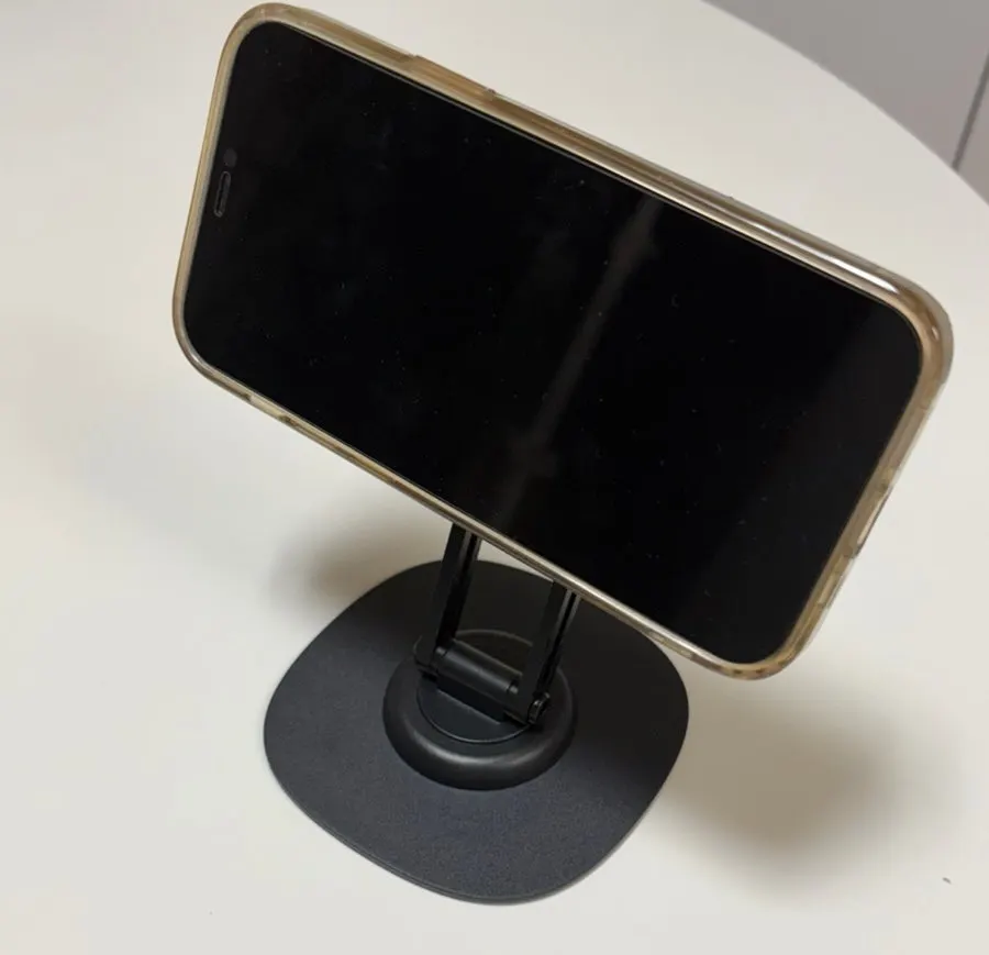 A phone mounted on the Bitinya MagSafe phone stand