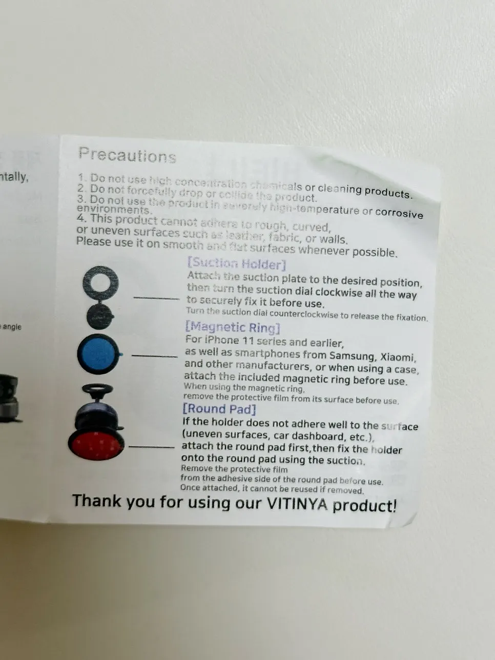 Phone mount attached to a flat surface