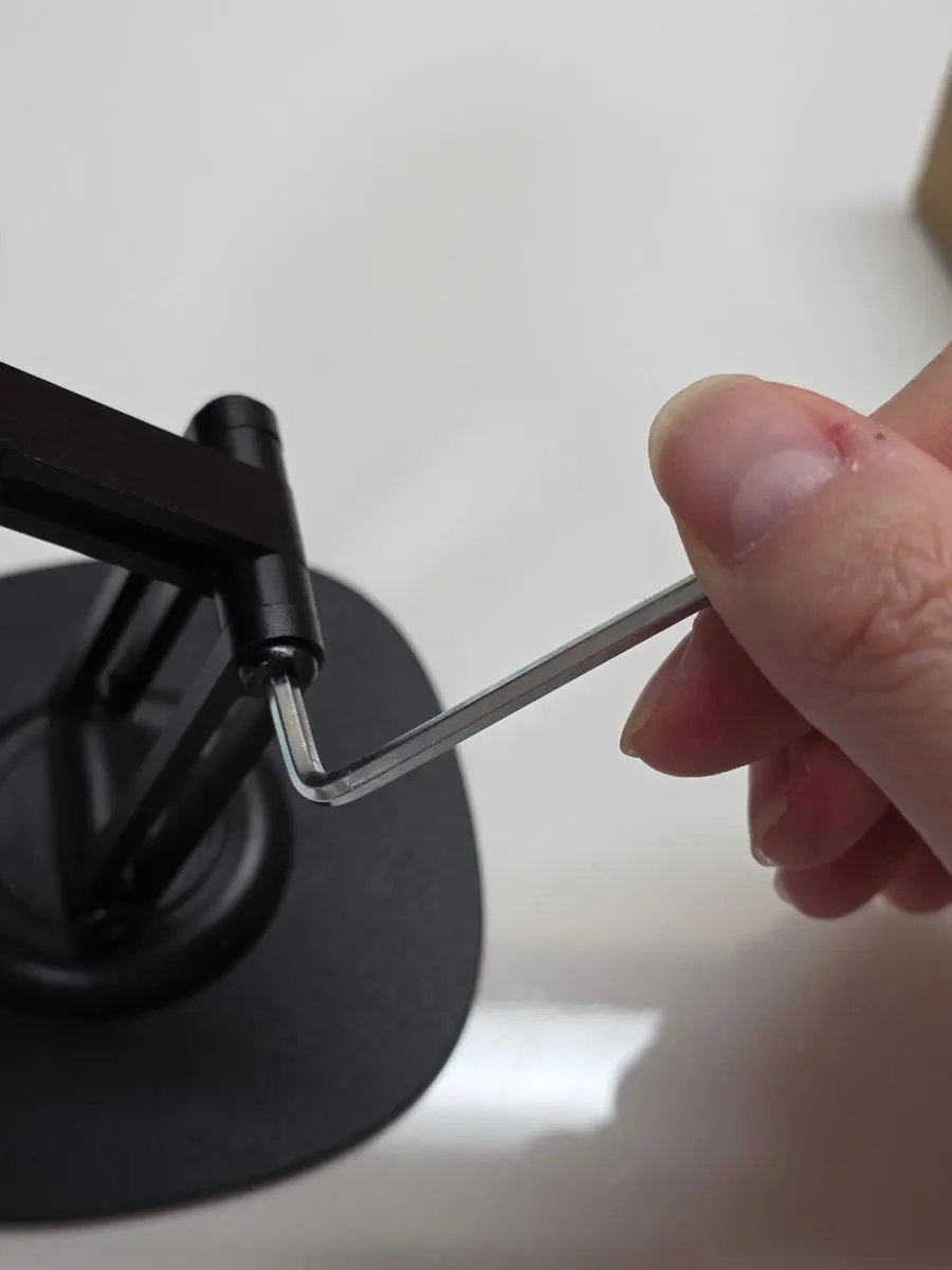 MagSafe stand for holding a smartphone on a desk