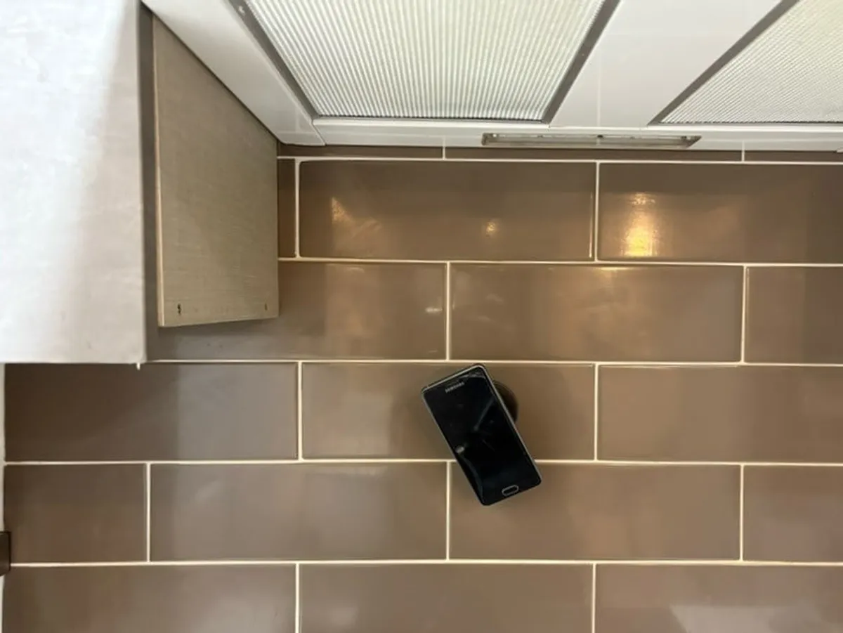 Phone mount used in the kitchen for viewing a recipe