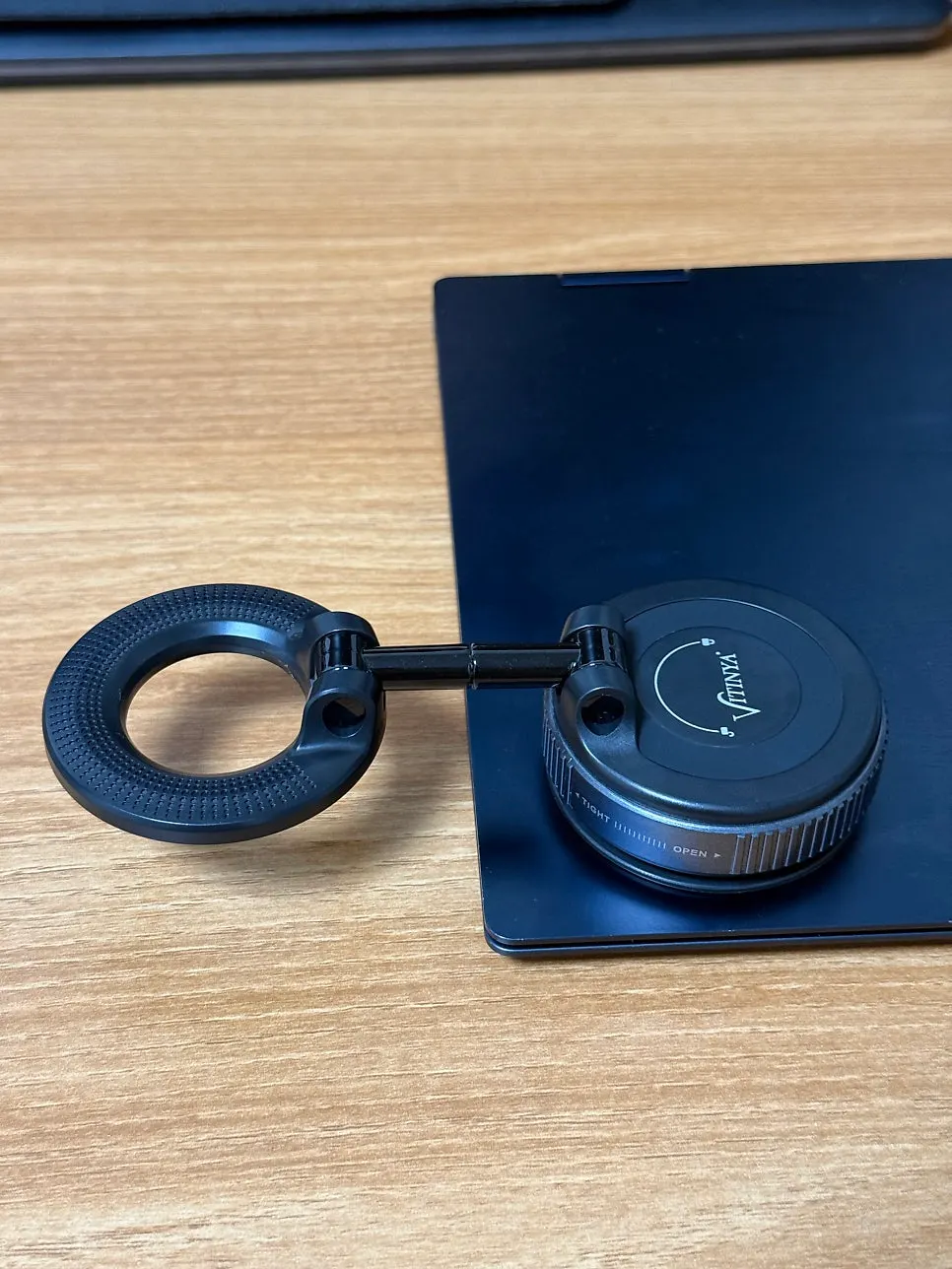 MagSafe stand with a twist-to-suction attachment