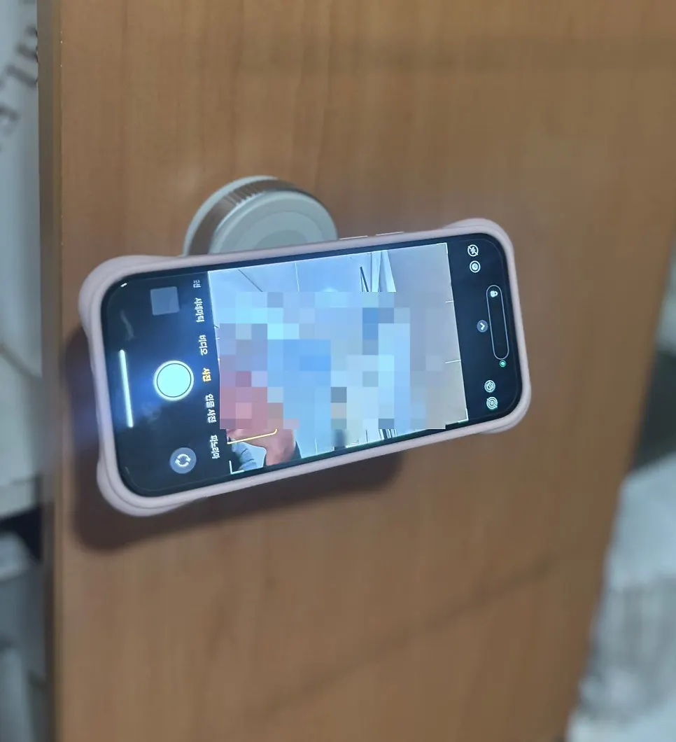 Phone mount used to check a recipe while cooking