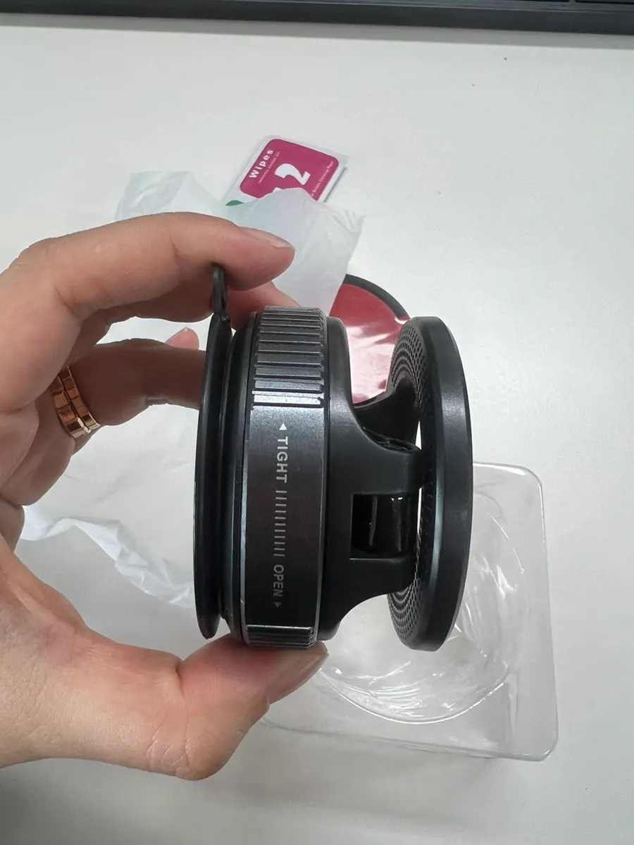 Car phone mount secured to a dashboard