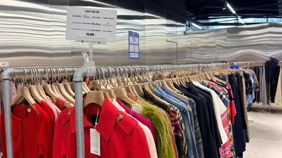 Clothing section with up to 50% off signage