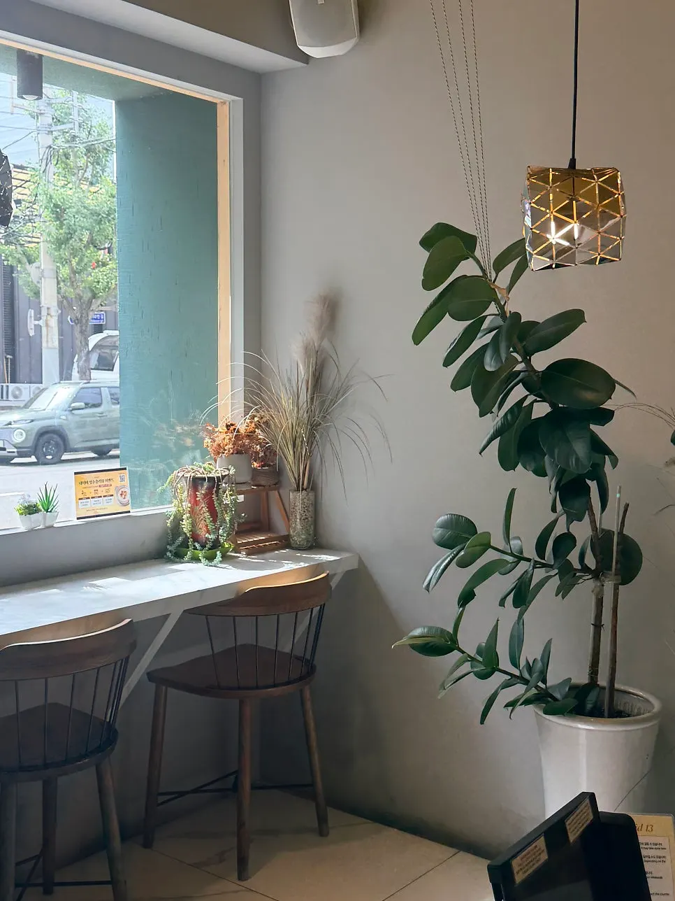 Window seats good for solo dining with roomy table spacing