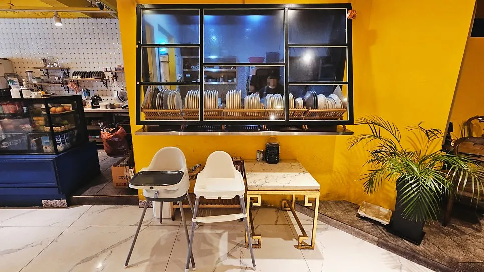 Table seating at Vivid13 brunch café