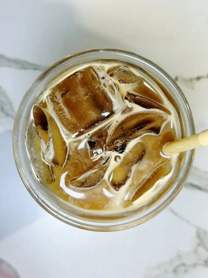 A layered Iced Caffe Latte