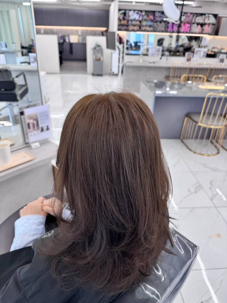 Ash brown hair after all-over coloring