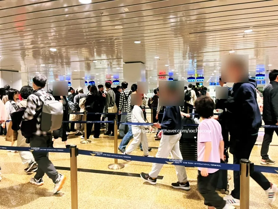 Cam Ranh Airport waiting area with travelers during school vacation