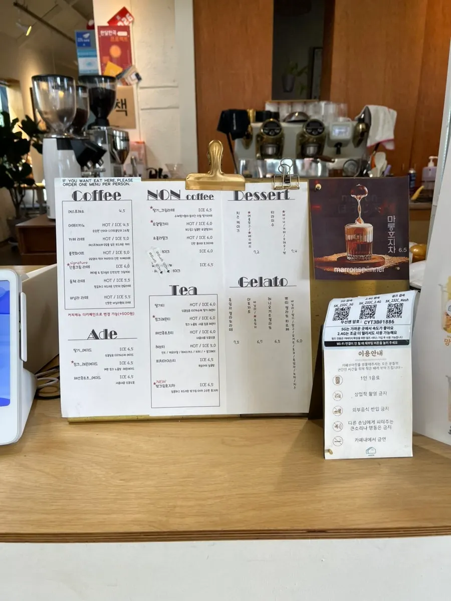 Order counter and tiramisu showcase at Café Buajang