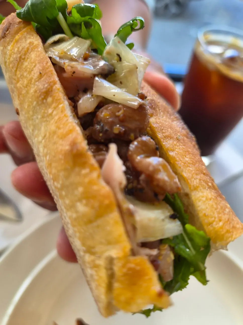 Cross-section of the baguette sandwich with jambon and green onion