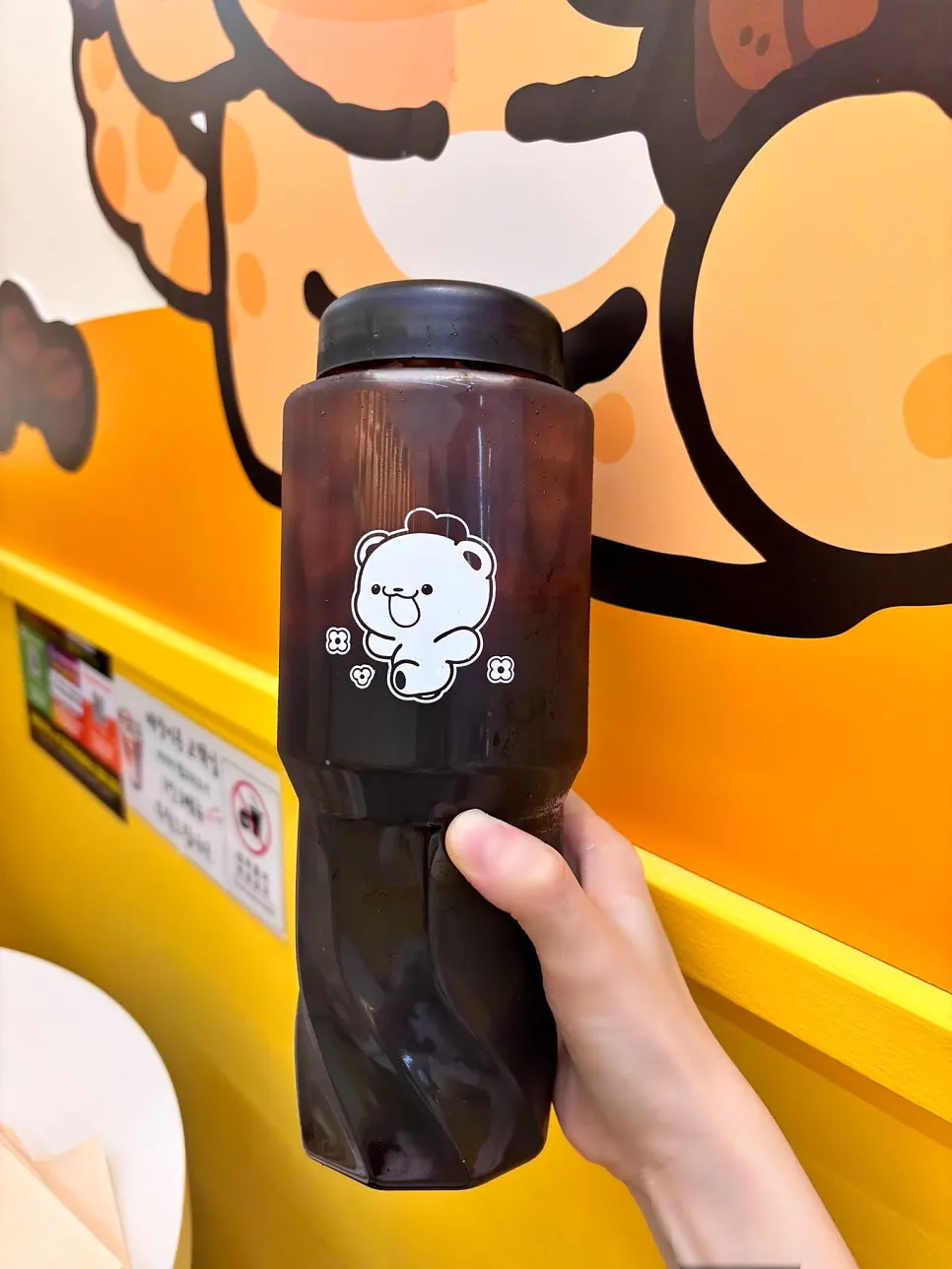 Holding the 1L cold brew bottle