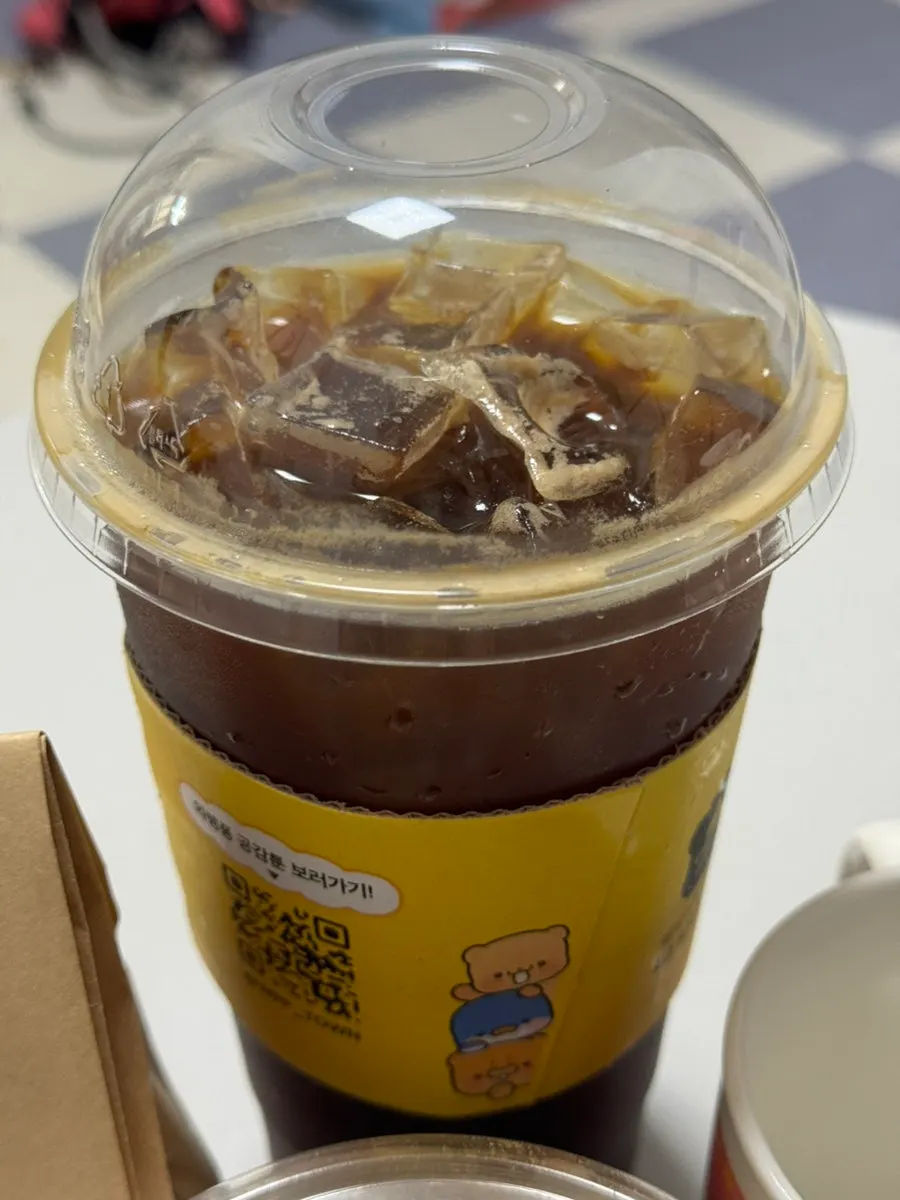 Iced Americano enjoyed alongside dessert