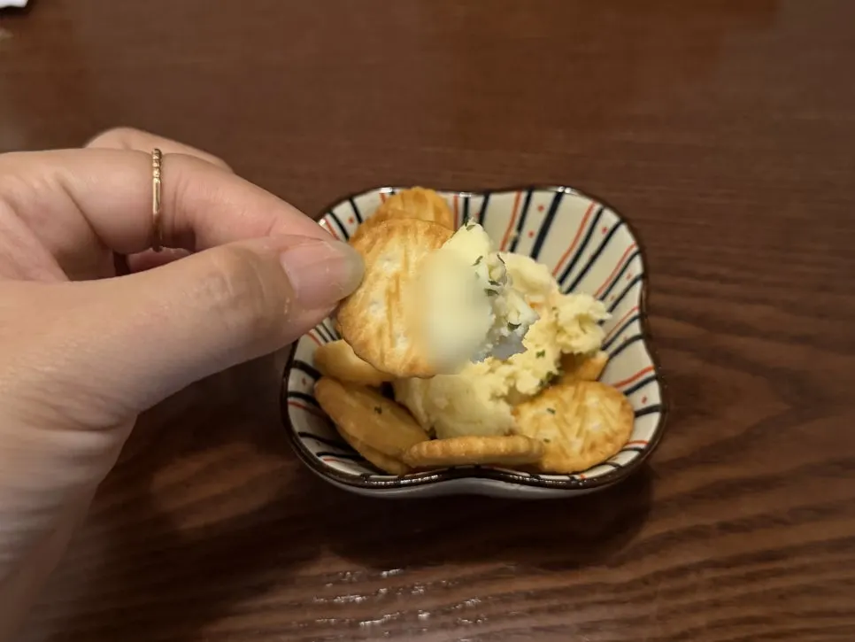 Basic side dish of potato salad with a small cookie