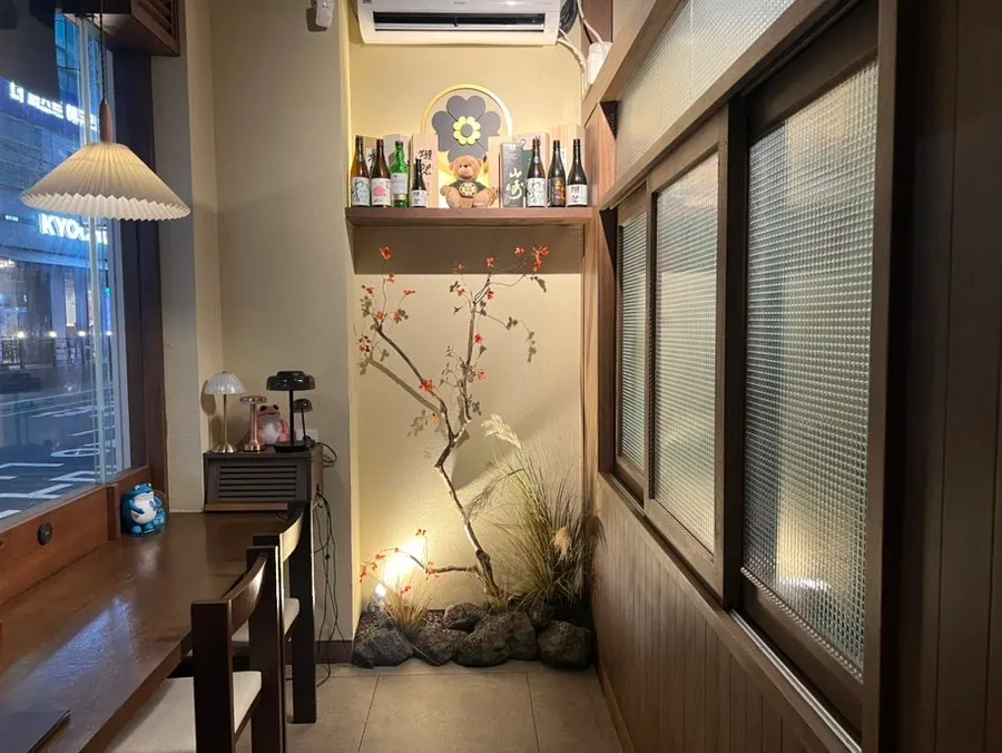Curtained-off private seating area at Wakoan