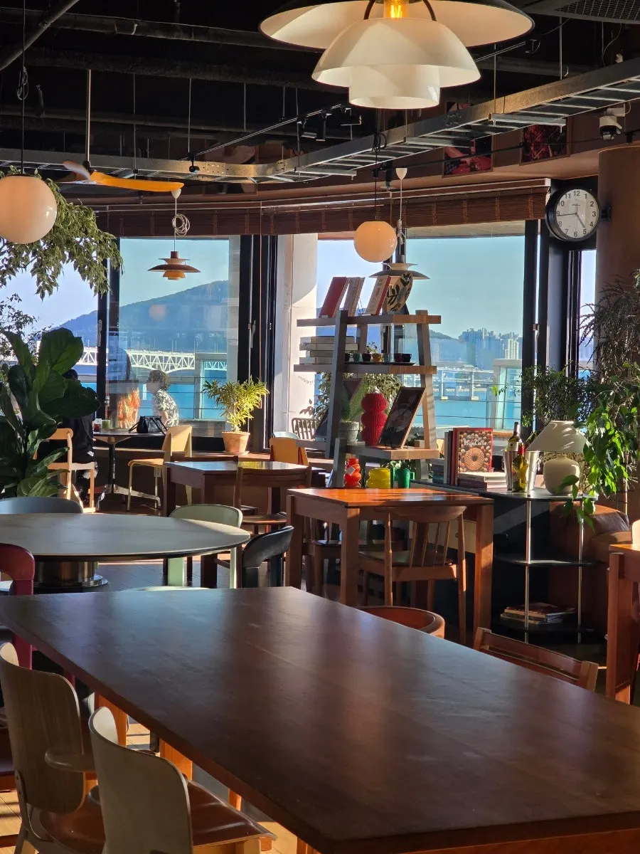 Long communal table seating at Working Holiday Minrak