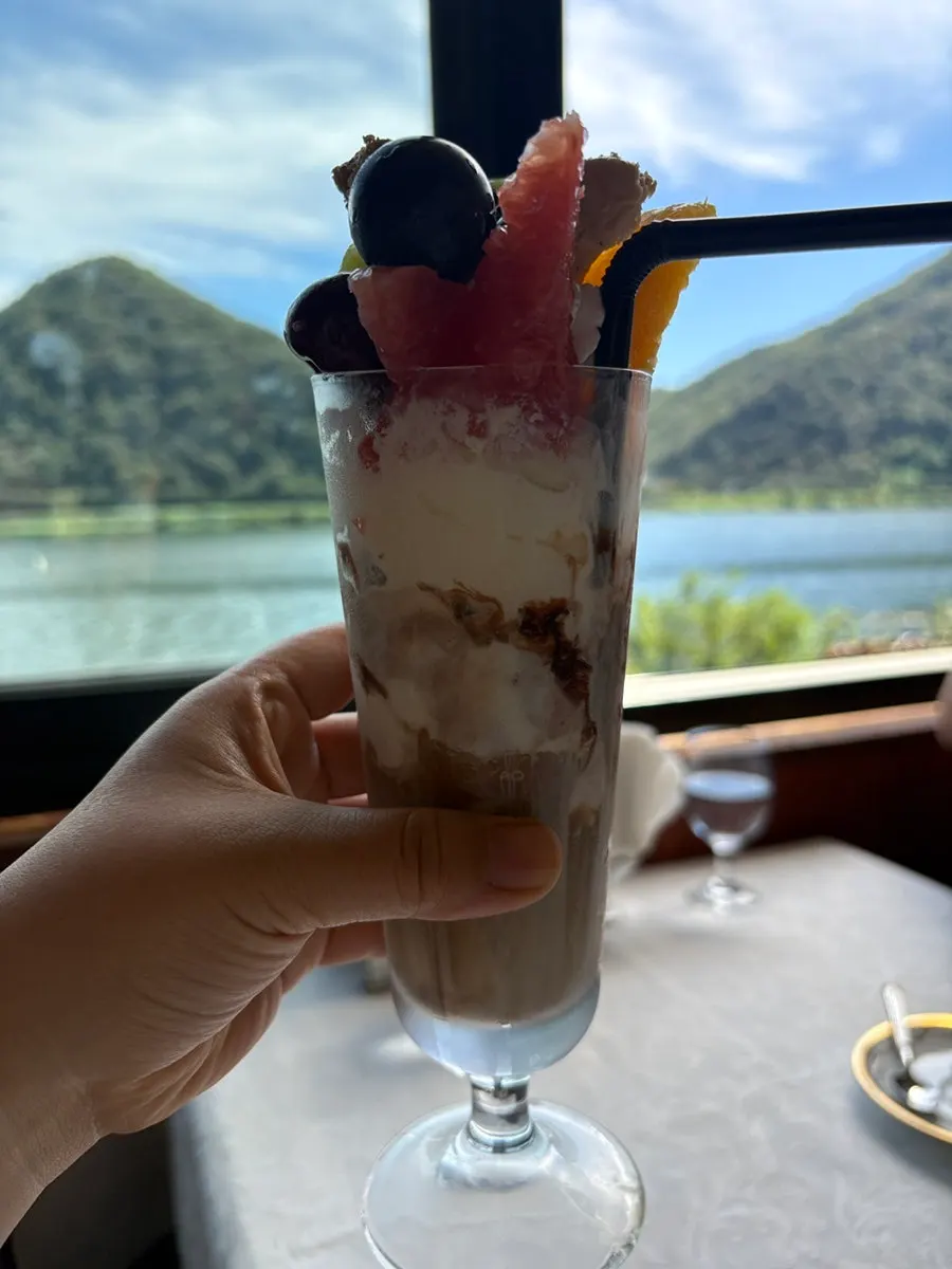Honor & Chevalier with ice cream, cheesecake, and fruit