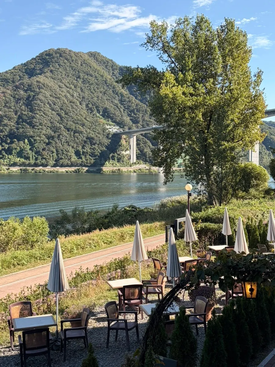 Outdoor seating overlooking the Bukhan River