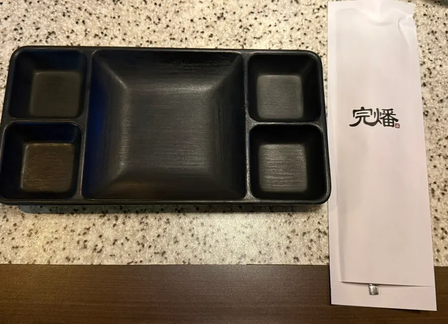 Small plate with divided sauce compartments and utensil set