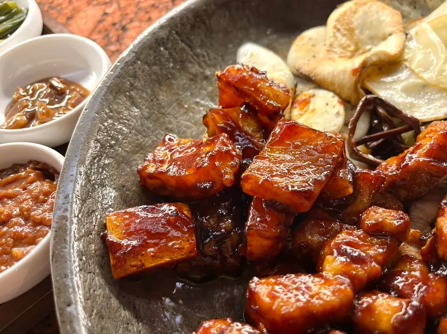 Close-up of pork belly grilled all the way to the skin