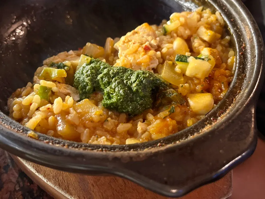 Doenjang risotto served with basil pesto