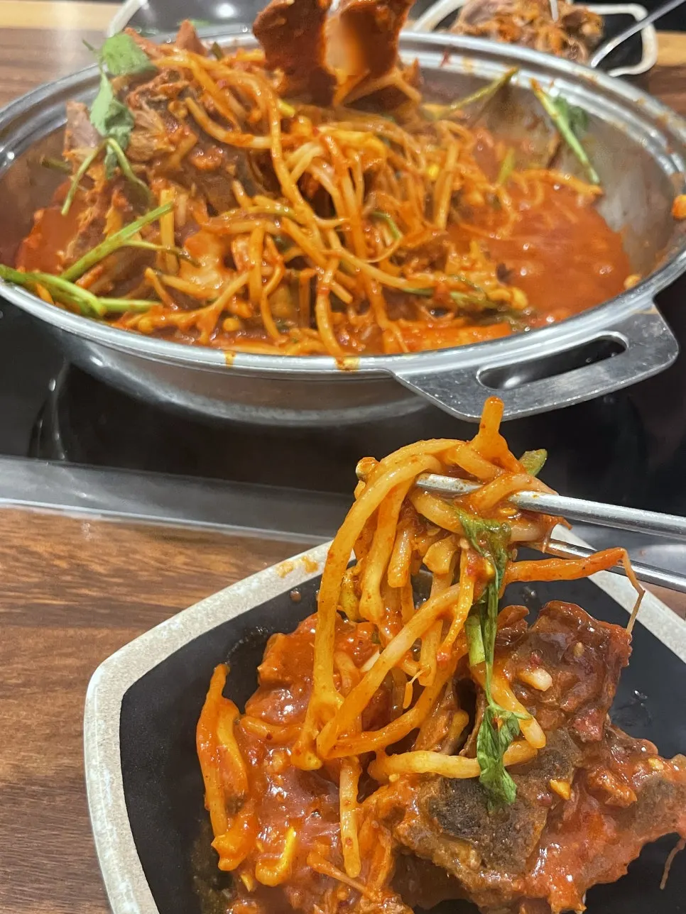Long rice cake sticks in the bone-in stew
