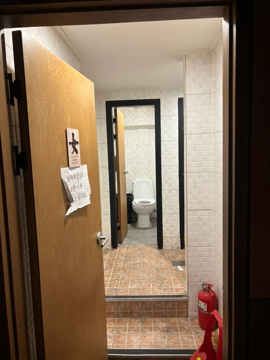 Separate men’s and women’s restrooms inside the restaurant