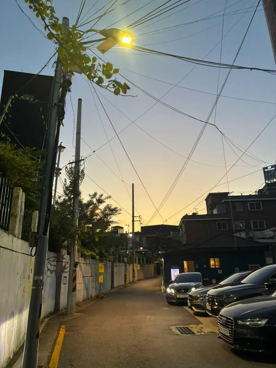 Exterior of Nerdy Blue Burrow tucked in the alley