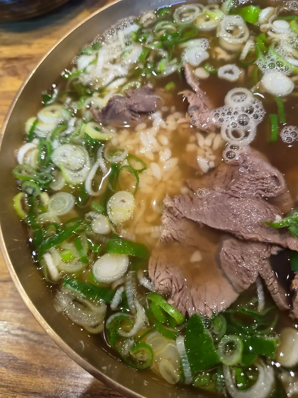 Toryeom-style rice soaked in the gomtang broth