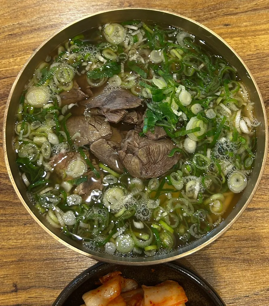 Special gomtang served with green onions on the side