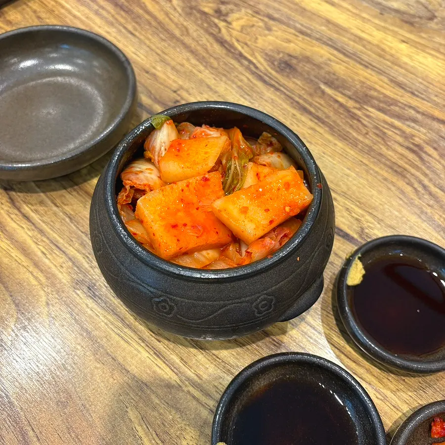 Jar of kkakdugi and napa cabbage kimchi