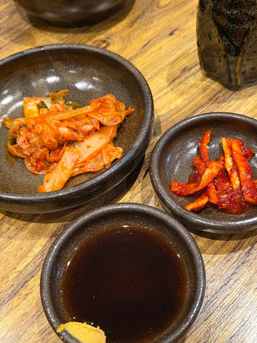 Seokbakji and dried radish portioned onto a plate
