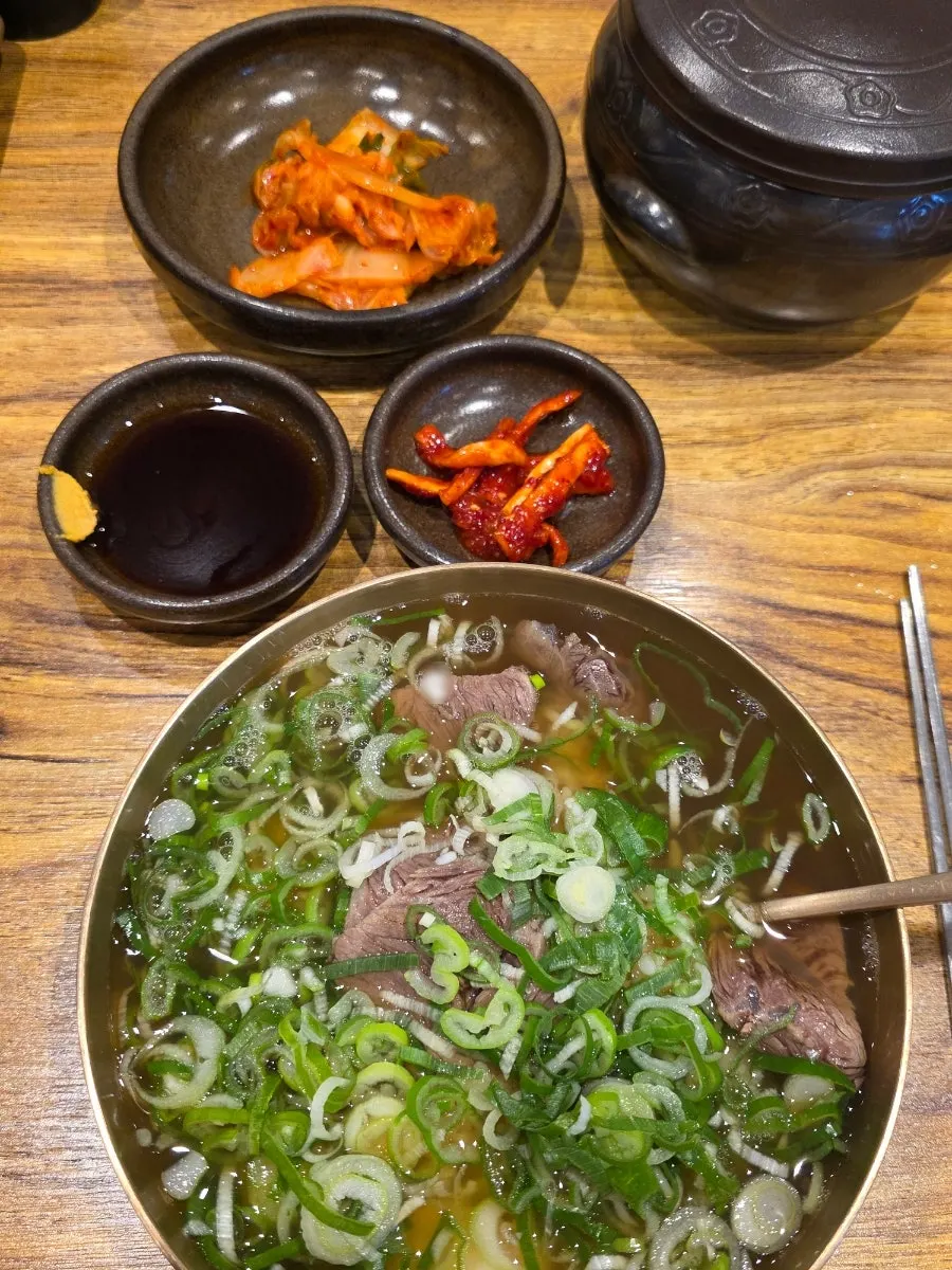 Dipping sauce for beef alongside the gomtang table setting