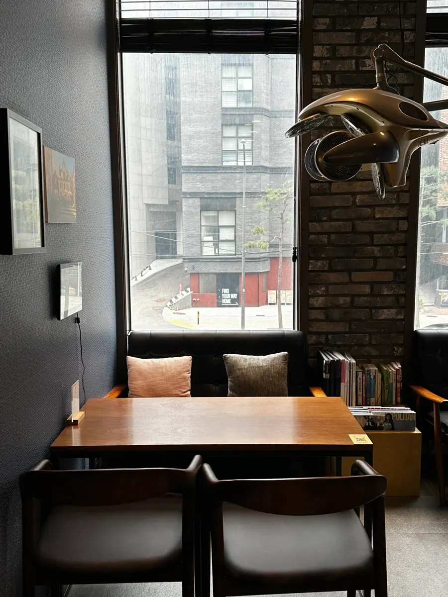 Wood-toned interior and spacious hair salon seating