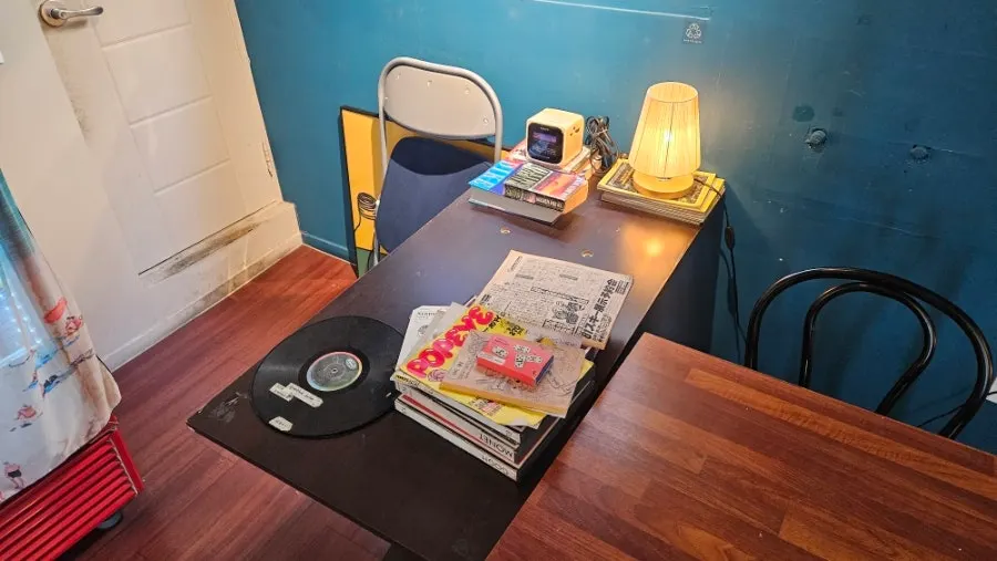 Café interior with objects and furniture blended together