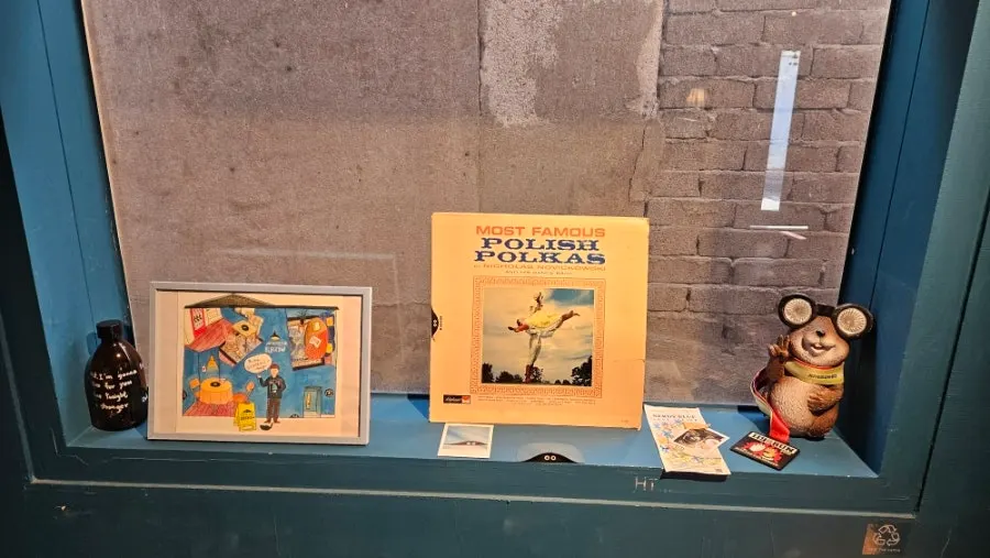 Seating area at Nerdy Blue Burrow with music playing