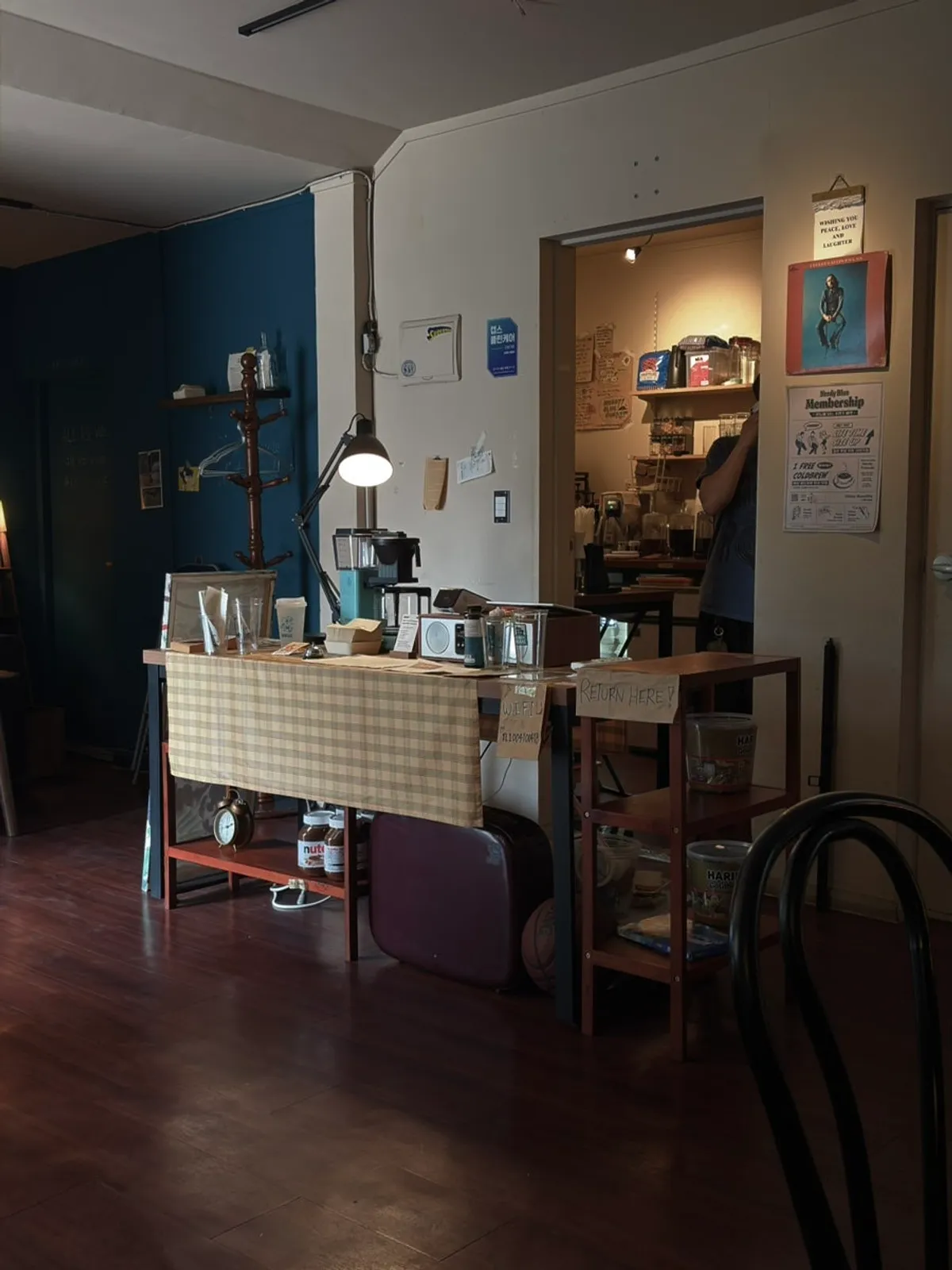 Entrance and store information at Nerdy Blue Burrow