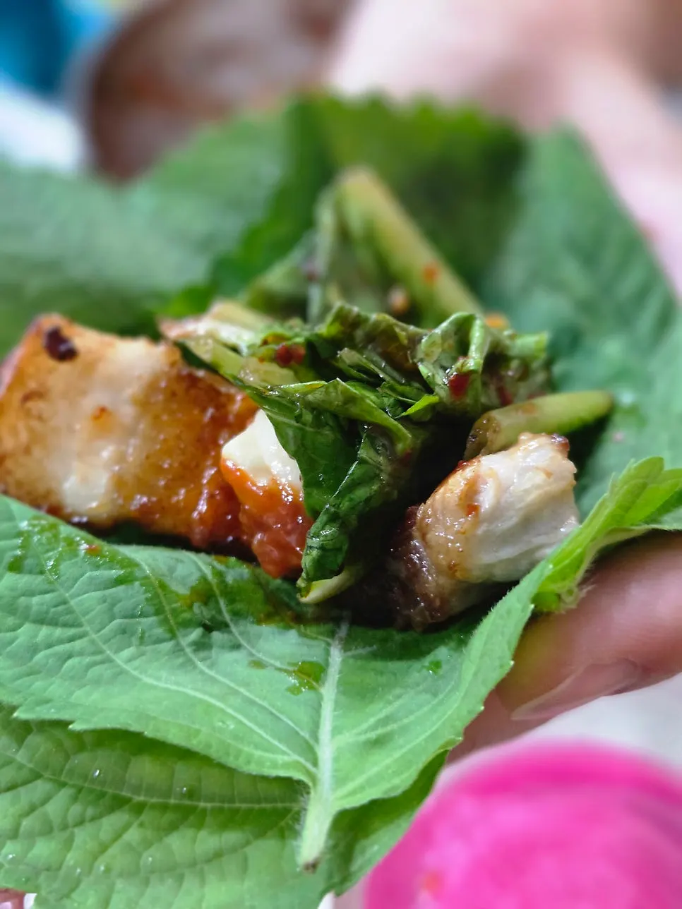 Pork belly wrapped in lettuce