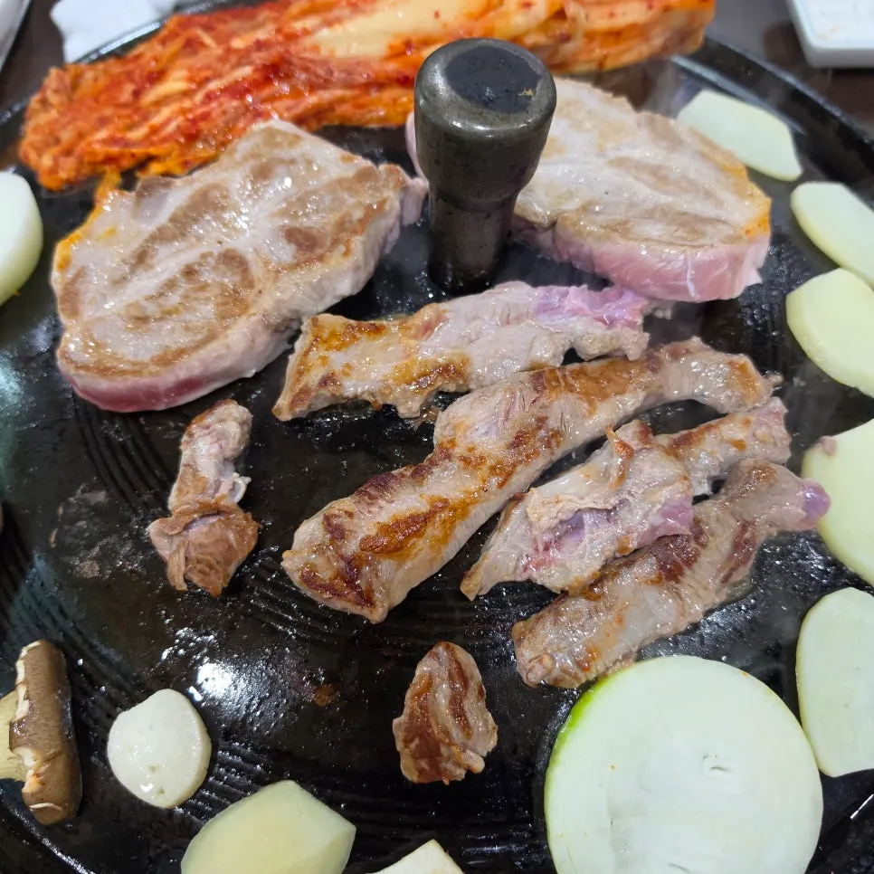 Thick pork neck cooking through