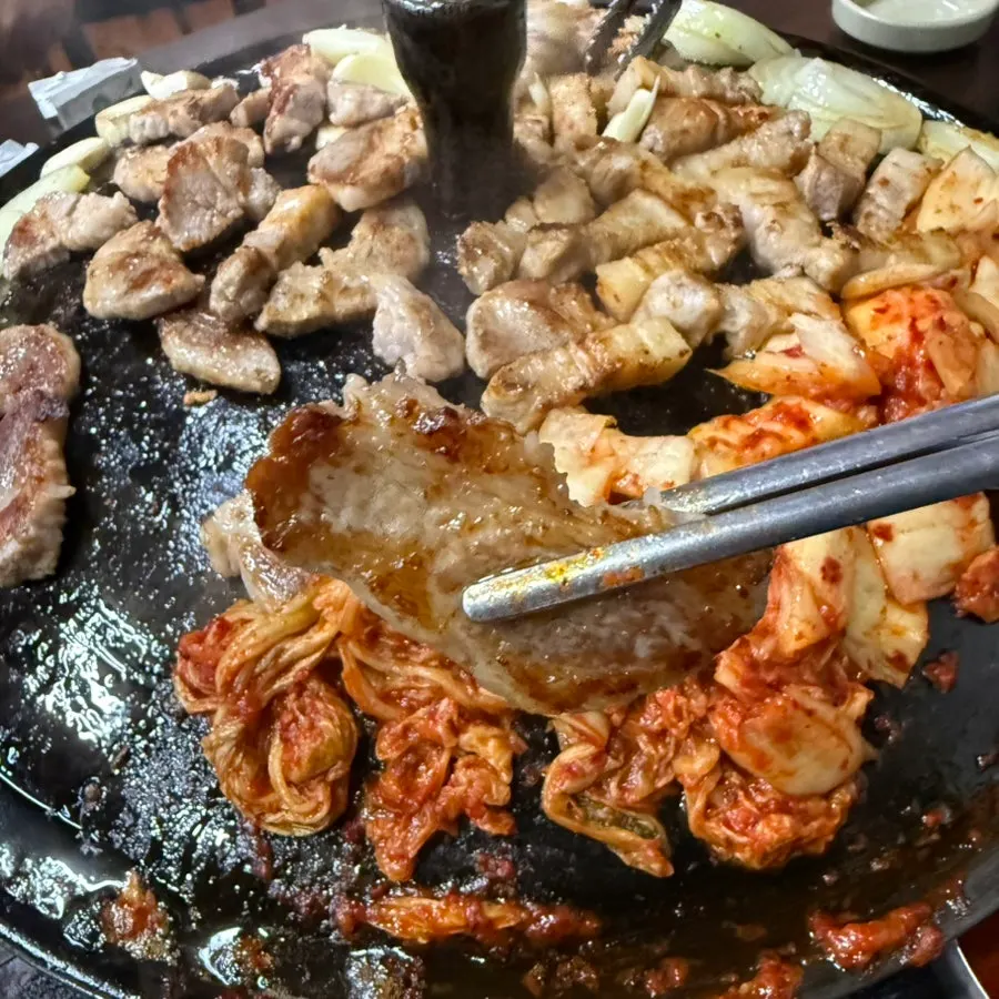 Pork belly and skirt meat together on the grill