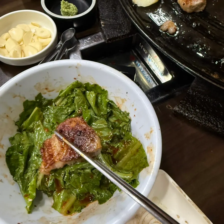 Kimchi grilling in pork belly fat