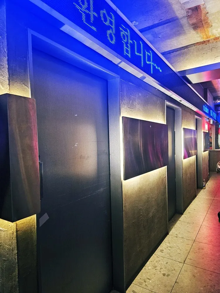 Three private rooms lined up along the wall