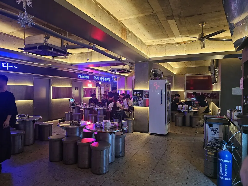 The spacious interior lit up with vibrant lighting