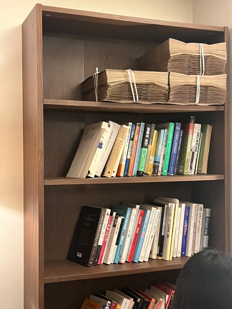 Eojil In first-floor space with books