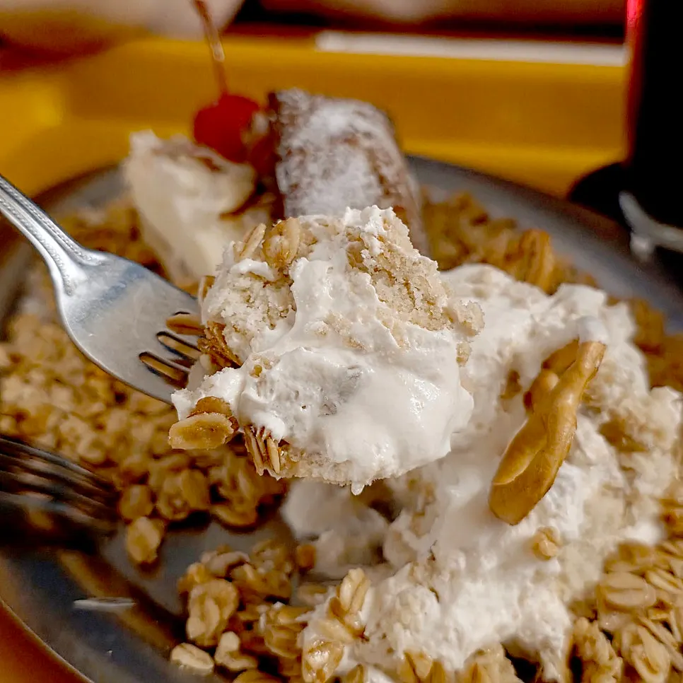 Cross-section of banana pudding full of custard cream