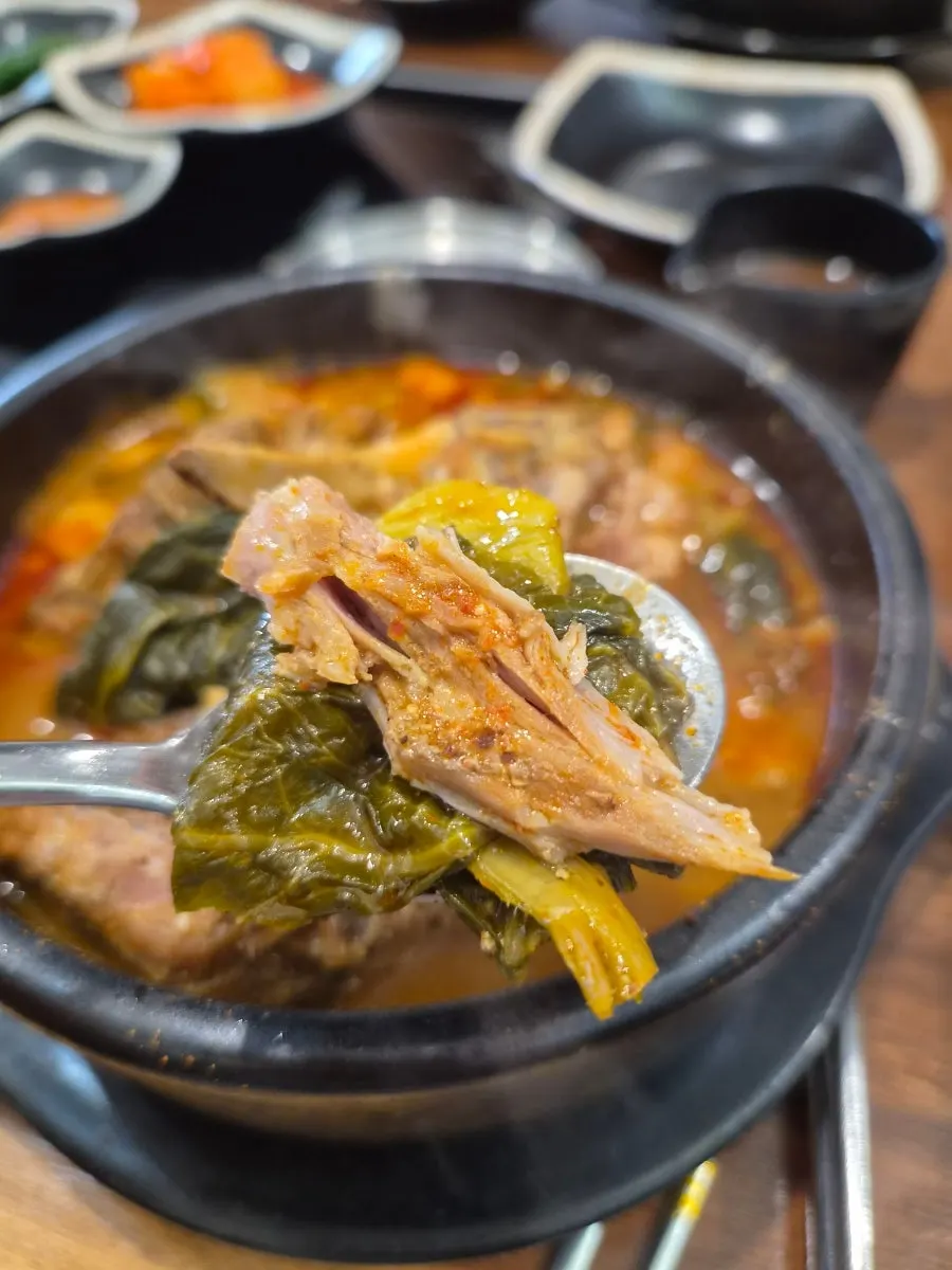 Bone soup meat wrapped in ugeoji leaves