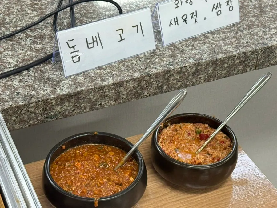 Meat dishes set out at the buffet