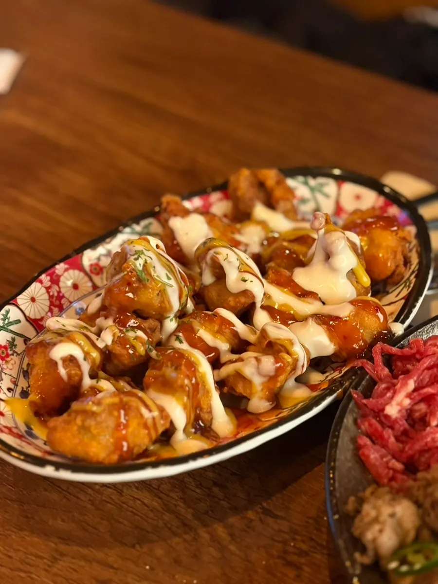 A plate of dakgangjeong-style Jonggatjip yangnyeom boneless fried chicken
